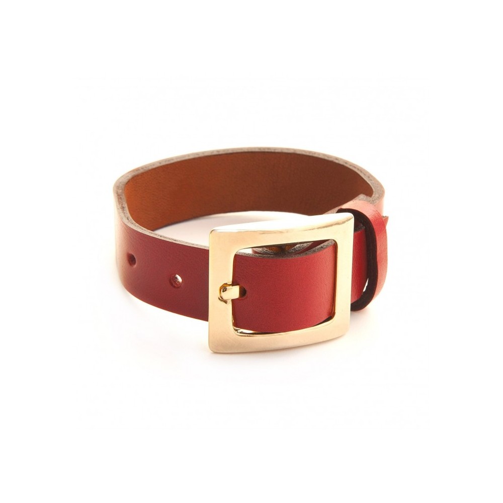 Leather bracelet and belt clasp in gold fashion jewellery.