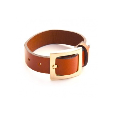 Leather bracelet and belt clasp in gold fashion jewellery.