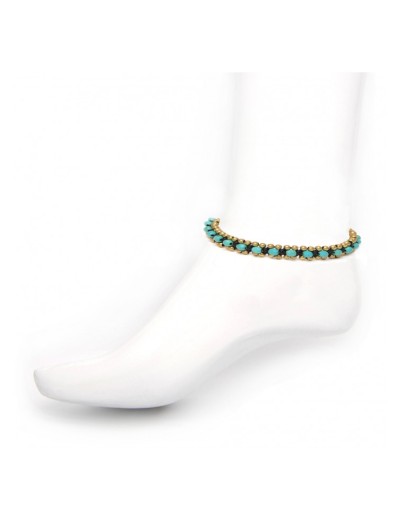 Anklet plaited in macramé with natural stones and brass beads.